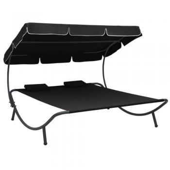 Tumbona de jardín con toldo y almohadas negras