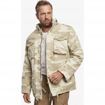 Chaqueta M65 Giant Beige Hombre Brandit - Características: diseño militar, color beige/sandstorm, material resistente, múltiples bolsillos, cierre frontal con botones, ajuste cómodo, estilo clásico