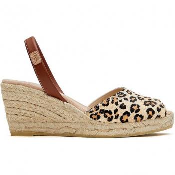 Sandalias de cuña en piel animal print