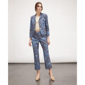 Pantalones acampanados en denim estampado