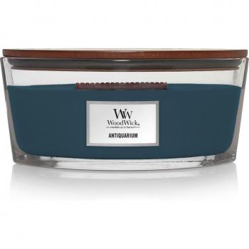 Woodwick Ellipse Antiquarium Candle - Type: Scented Candle; Characteristics: Wood wick for crackling sound, unique ellipse shape, long burn time, premium fragrance blend, decorative glass vessel