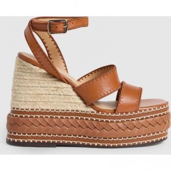 Sandalias de cuña en piel con cierre lateral de pulsera con hebilla metálica
