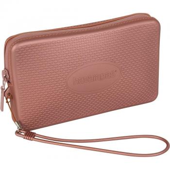 Bolso de mano Havaianas en tono rosa para complementar tu look