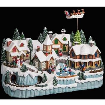 Pueblo de Navidad Giethoorn luminoso con patinadores, túnel, tren y Papa-Noel con renos volando - 55x31x34.5 cm, incluye tren y reno musical con 45 LED