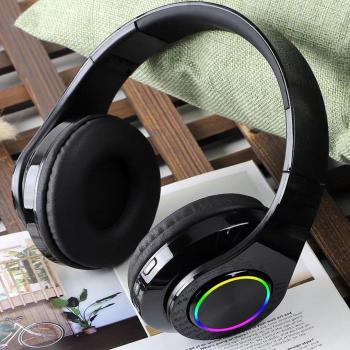 Auriculares inalámbricos con cancelación de ruido para juegos y TV, con micrófono y luces LED multicolores