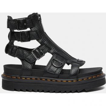Sandalias de plataforma Dr. Martens Olson en piel negra con cierre de cremallera.