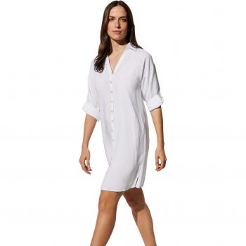 Vestido camisero blanco de Ysabel Mora con detalles en tejido liso y botones