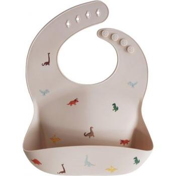 Babero de silicona Mushie con recuperador, diseño de dinosaurios, color beige