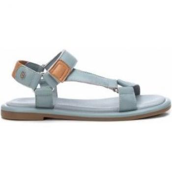 Sandalias planas de mujer de piel color azul con cierre adherente