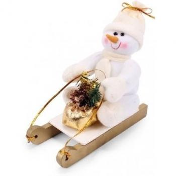 Muñeco de nieve con trineo