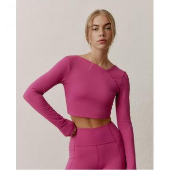 Top deportivo manga larga Ego - Fucsia con espalda descubierta