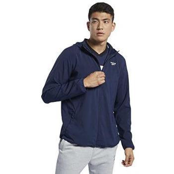 Chaqueta Reebok Essentials Azul para Hombre, Talla S, material ligero, diseño deportivo, cierre de cremallera completo, bolsillos laterales con cremallera