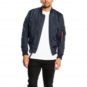 Chaqueta Bomber MA-1 TT ALPHA INDUSTRIES con diseño de aviador, material resistente, forro acolchado, cierre frontal a presión, bolsillos laterales y parche en la manga