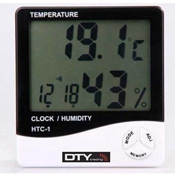 Reloj termómetro higrómetro que mide la temperatura y la humedad de la casa