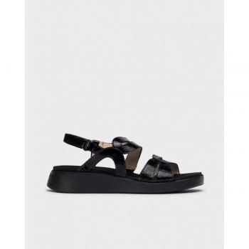 Sandalias planas de mujer Wonders WAVE en piel negra con ajuste trasero