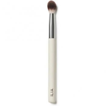 ILIA Blending Brush - A makeup brush designed for blending eyeshadows and other cosmetics, featuring soft bristles for smooth application, a tapered shape for precision, cruelty-free materials, and an ergonomic handle for comfortable use