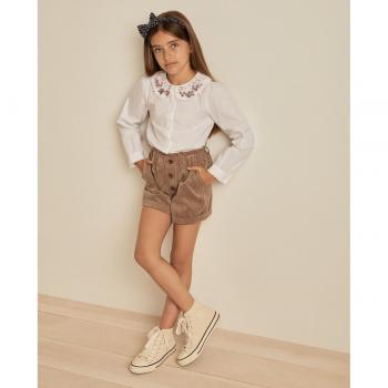 Short de niña Coconut El Corte Inglés con diseño tropical, tejido ligero, cintura elástica, dos bolsillos laterales y estampado colorido