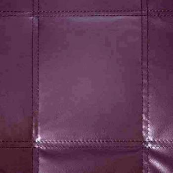 Diván con almohada marrón de cuero sintético
