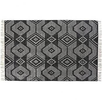 Alfombra de algodón con flecos y diseño geométrico en blanco y negro