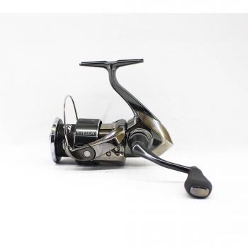 Carrete Shimano Stella 2500 FK Spinning, tamaño 2500, modelo STL2500FK, diseño ligero y resistente, sistema de freno progresivo, rodamientos de acero inoxidable, cuerpo de CI4+, rotor de aluminio forjado