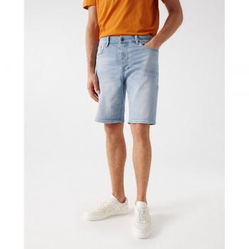 Bermuda de hombre lisa en denim azul con efecto de lavado