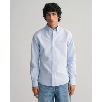 Camisa Oxford Slim Fit azul Gant para hombre con corte slim y detalle de escudo