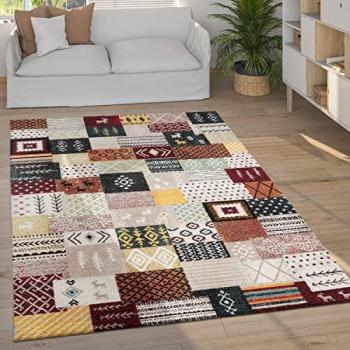 Alfombra de diseño moderno y vintage, pelo corto, motivo boho chic y dibujo geométrico, tamaño 160x230 cm, color multicolor en tierra rojo y verde