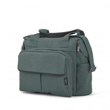 Bolso Inglesina Aptica Dual Bag con diseño en color verde esmeralda y cambiador incluido