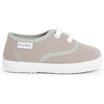 Zapatillas de lona para niños con cordones.