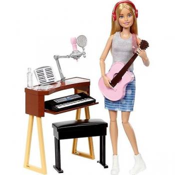 Muñeca Barbie Articulada para Juegos y Colección con características de movilidad en brazos y piernas, detalles realistas en el vestuario, cabello estilizable, incluye accesorios relacionados con la música