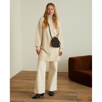Vestido de punto con cuello alto y mangas abullonadas en color beige para mujer