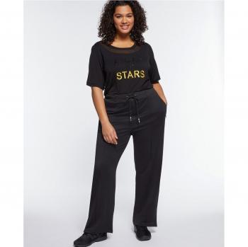 Pantalones joggers con aplicaciones en tul de malla y pedrería