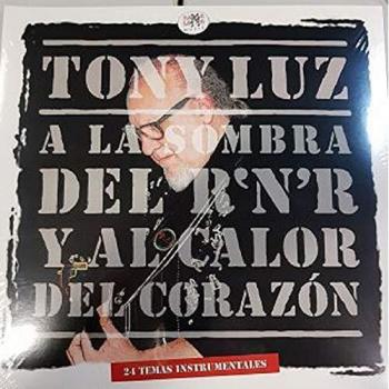 A la Sombra del R'N'R/Al Calor Del Corazón [Vinilo]
