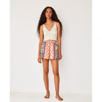 Pantalón corto de pijama satinado con estampado