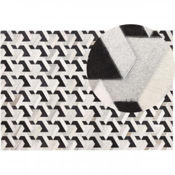 Alfombra de piel de vaca patchwork geométrico blanco y negro 160 x 230 cm estilo moderno Narman