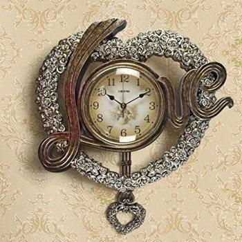 pared Amor triunfante sala de estar de la manera del reloj de estilo europeo de alta calidad artística reloj de oscilación de reloj de silencio