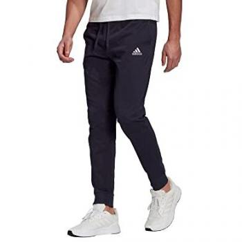 Pantalón largo adidas Essentials de Jersey simple con puños ajustados, color azul marino, talla M