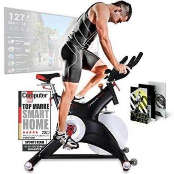 Sportstech Bicicleta estática profesional SX500 -Marca de Calidad Alemana -Eventos en vivo y App Multijugador, volante de 25KG, compatible con pulsómetro, Pedales de Click SPD, hasta 150KG, con eBook