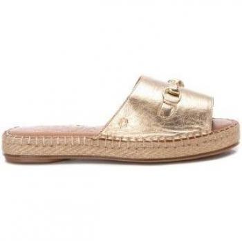Sandalias planas de mujer de piel y pala ancha