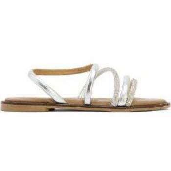 Sandalias planas de piel con tiras tubulares brillantes en color plata